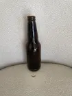 Photo #3. Complaint-review: Alexander Keith s Brewing - Glass was found inside bottle after it was opened.