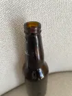 Photo #2. Complaint-review: Alexander Keith s Brewing - Glass was found inside bottle after it was opened.